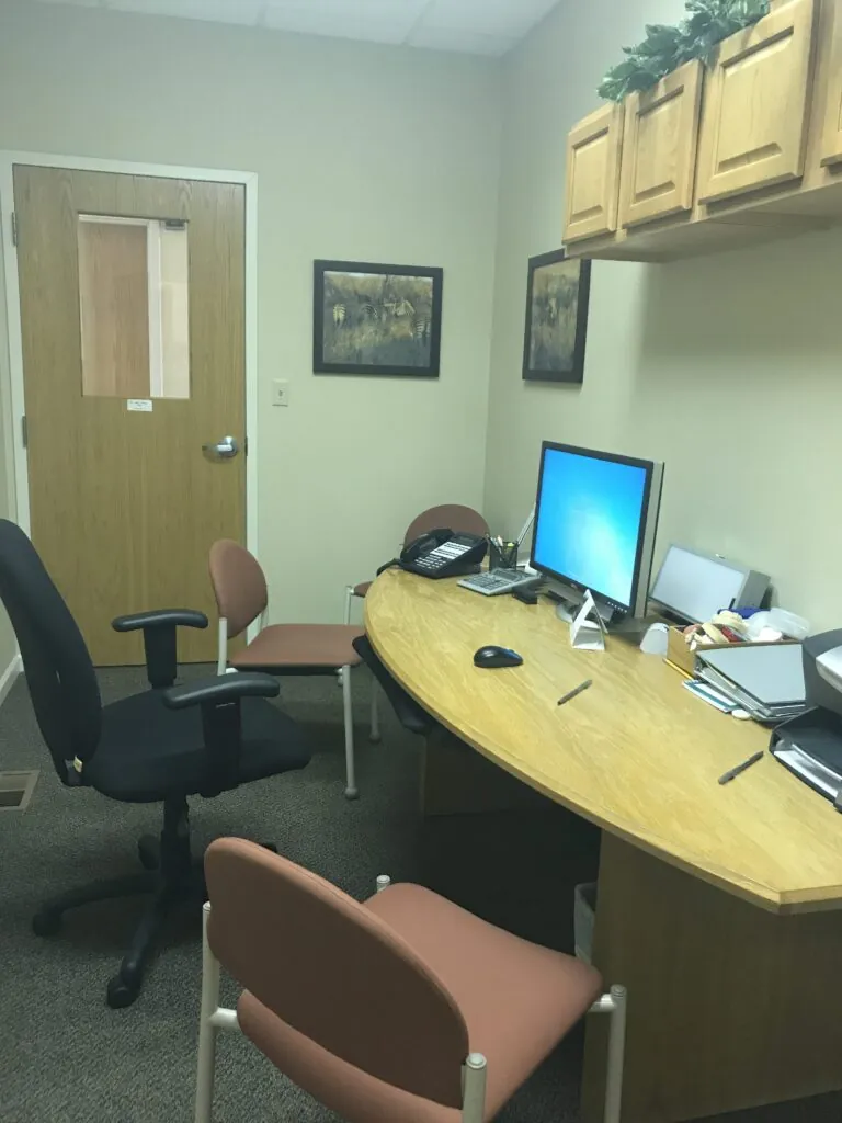 Dr. Chase Ellinwood's office where he discusses dental treatment with patients